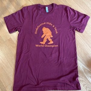 Bella+Canvas Undefeated Hide & Seek World Champion picture of “Bigfoot”